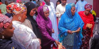 Borno first lady sharing relief package to vulnerable members of the society.
