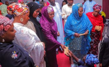 Borno first lady sharing relief package to vulnerable members of the society.