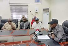 BOGIS boss addressing the press.