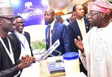 President of Federal Republic of Nigeria, Asiwaju Bola Ahmed Tinubu, discussing with Jibrin Abubakar of Dangote’s corporate communications department at the Dangote stand at the ongoing 29th Nigerian Economic Summit in Abuja on 23rd October 2023