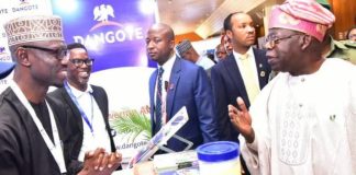 President of Federal Republic of Nigeria, Asiwaju Bola Ahmed Tinubu, discussing with Jibrin Abubakar of Dangote’s corporate communications department at the Dangote stand at the ongoing 29th Nigerian Economic Summit in Abuja on 23rd October 2023