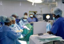 Doctors performing the surgery.