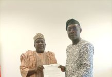 La'ori with DG NILEST at his office where he presented C of O of the land where NILEST will be built.