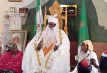 Emir of Dass with the celebrant.