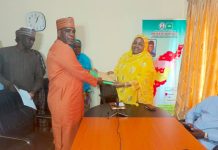Zira taken over the instrument of office from immediate past DG of PAWECA Bello.
