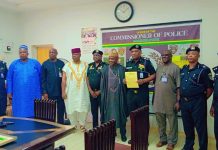 Adamawa CP with officials of the state govt during the presentation of letter of communication.