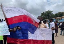 Protesters displaying Russian flags.