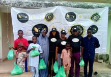 Officials of MMOF with some of the benefiting orphans.