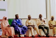Participants during a panel session of the dialogue.