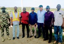 The director of dams and reservoir operations with members of his team during the facility tour of Kiri Dam on Thursday.