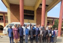 University council and panel in a group photo.