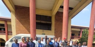University council and panel in a group photo.