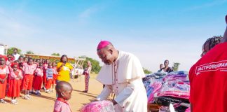Bishop Mamza during the distribution of the school materials at Missio primary school Damare on Thursday.