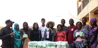 Group picture of stakeholders during the opening of sanitary pad bank at GDJSS Yelwa, on Friday.