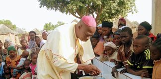 Bishop Mamza commissioning the water project undertaken by JDPC and Mission Take Heart at Tashar Turmi on Friday.