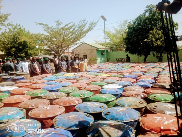CG of customs, Bashir Adewale Adeniyi inspecting the petrol seizures made after addressing a press conference in Yola on Thursday.