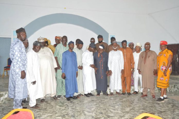 Group photo of key stakeholders during the town hall meeting at Numan.