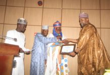 The FMC B-KUDU MD Receiving the award of excellence yesterday.