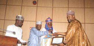 The FMC B-KUDU MD Receiving the award of excellence yesterday.