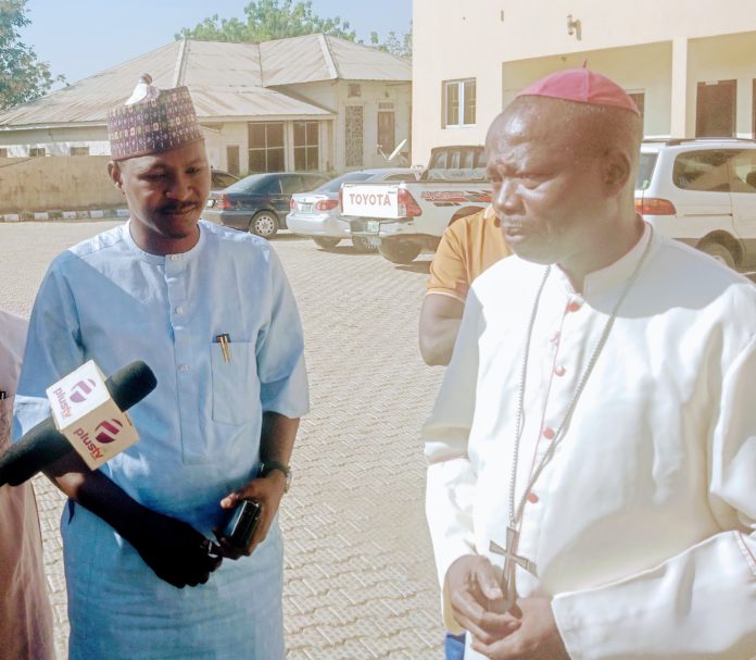 Comrade Chakuyada Godwin the representative of the president of Emnamu foundation Emmanuel Musa, during the handover of the car to Bishop Mamza at the Catholic Secretariat Yola Monday.