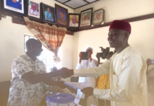 The new chairman Ibrahim Kado in a handshake with NUJ chairman Adamawa State council shortly after he was sworn in on Wednesday.