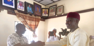 The new chairman Ibrahim Kado in a handshake with NUJ chairman Adamawa State council shortly after he was sworn in on Wednesday.