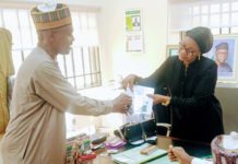 The Director of public prosecution Barr Ishaq Abdullahi presenting the documents to Adamawa CJ at her office in Yola on Thursday.