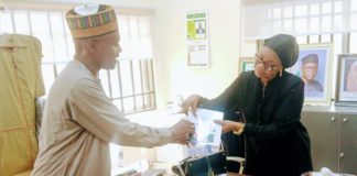 The Director of public prosecution Barr Ishaq Abdullahi presenting the documents to Adamawa CJ at her office in Yola on Thursday.