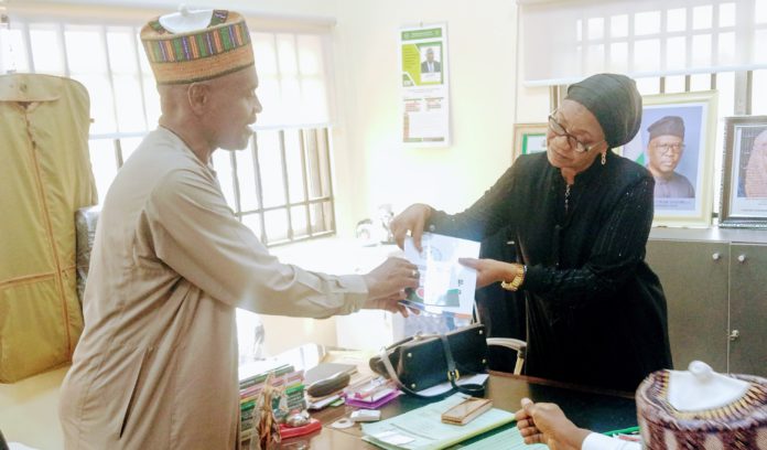 The Director of public prosecution Barr Ishaq Abdullahi presenting the documents to Adamawa CJ at her office in Yola on Thursday.
