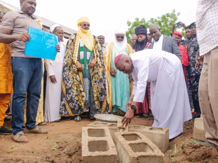 Bishop Mamza laying the foundation of the proposed church at Gamu in Ganye LG on Sunday.