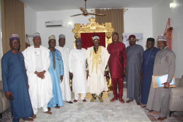 Mbege Ka Michika HRM Bulus Luka Gadiga in a group picture with the coronation ctee during a courtesy visit.