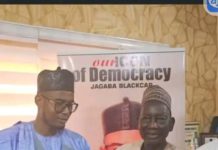 The secretary of the Lunguda traditional council conveying the letter of appointment of Ribadu as TITTIWALIWA NUNGURAYA in his office in Yola.