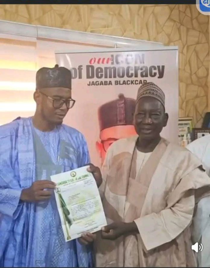 The secretary of the Lunguda traditional council conveying the letter of appointment of Ribadu as TITTIWALIWA NUNGURAYA in his office in Yola.