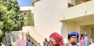 Lami Fintiri donating a motorcycle to a person living with disability.