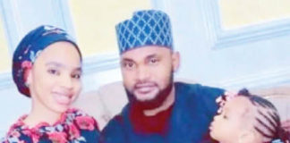 The kidnapped couple alongside their daughter.