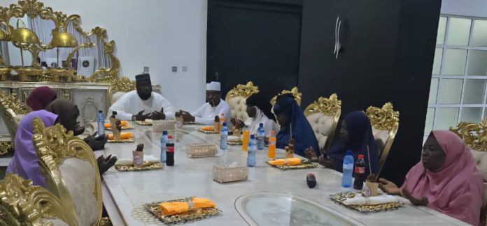 Comrade Mustapha Salihu with stakeholders during the donation of the house.