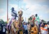 Camel riders on display during the event.