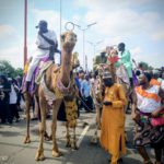 Camel riders on display during the event.