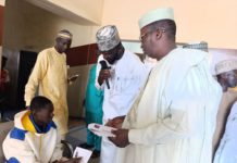 Reps of Comrade Mustapha Salihu donating cash incentives too indigent patients.