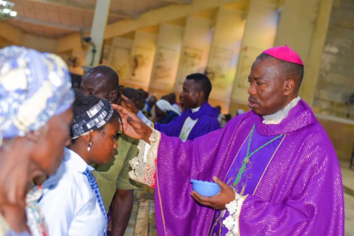 Bishop Mamza applying ash to congregants to mark the commencement of Lenten. Bishop Mamza applying ash to congregants to mark the commencement of Lenten.