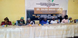 The press conference in session.