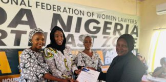 Barr Lubna M Dodo receiving her certificate of return after swearing in as chairperson of Adamawa State branch of FIDA on Friday.