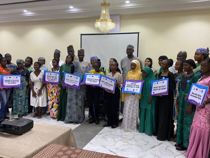 Group picture of stakeholders during the IWD commemoration in Yola on Tuesday.