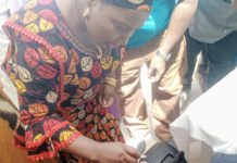 Yola North LG vice chairman, Sarah Nathan administering the two doses of the vaccine on a child during the flag off of the campaign in Yola North on Sunday.