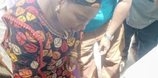 Yola North LG vice chairman, Sarah Nathan administering the two doses of the vaccine on a child during the flag off of the campaign in Yola North on Sunday.