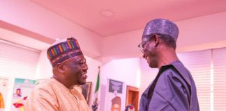 Ribadu and Fintiri in a warm embrace.