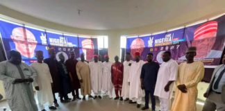 A group pic of Kwankwaso with members of the movement on Thursday in Abuja.
