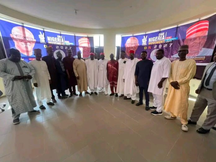 A group pic of Kwankwaso with members of the movement on Thursday in Abuja.