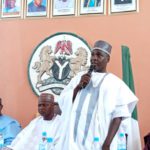 The chairman alongside other critical stakeholders making a point marking activities for the celebration of 100 days in power.
