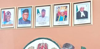 The chairman alongside other critical stakeholders making a point marking activities for the celebration of 100 days in power.